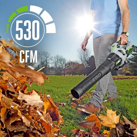 Person using Cordless Electric Leaf Blower With Battery, Turbo Mode, 110 MPH Air Speed, 530 CFM in a yard scene