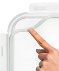 Airtight locking lid seal demonstration on the Mega Sized Glass Food Storage Container With Airtight Locking Lid 6500 Ml 28 Cup Capacity BPA Free And Oven Safe Ideal For Storing Food Vegetables Fruits Meal Prep Casseroles Lasagna Roasting Turkey And Chicken