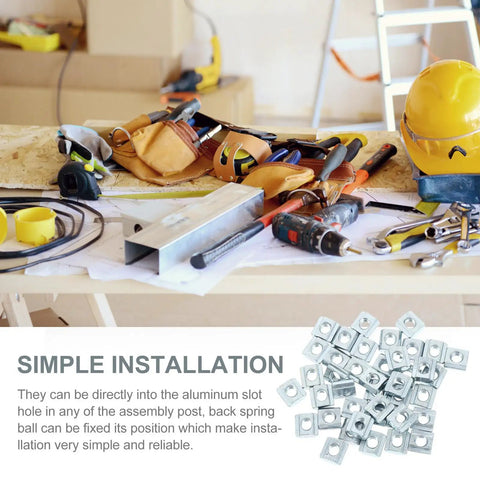 Forty Pack Carbon Steel T Slot Nuts on a cluttered workbench with tools, showcasing installation ease for aluminum rails.