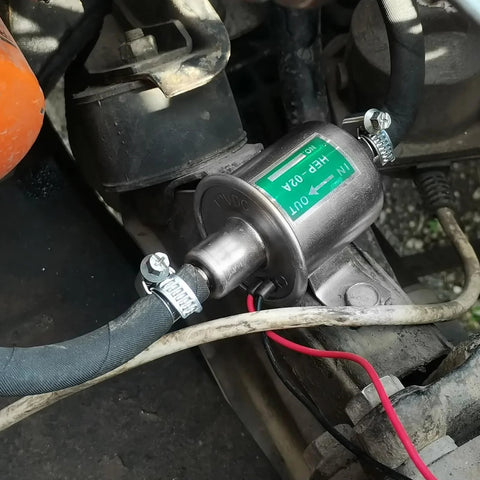 12V Inline Fuel Pump Universal Low Pressure 3-6 PSI, 30 GPH, 8mm Hose, Copper Clad Aluminum installed in engine bay.