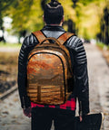 Person wearing Log Cabin Maple Scene Printed Unisex Backpack With Large Capacity, walking on autumn path with skateboard.