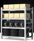 Rock Solid Heavy Duty Garage Shelving Four Tier Commercial Steel Storage Rack Industrial Grade Metal Organizer For Home Pantry Kitchen And Workshop With Heavy Gauge Steel Construction And Cross Bracing, storing boxes and tires.