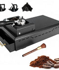 Game Changing Electric Portafilter Cleaner And Espresso Knock Box With Large Stainless Steel Coffee Grounds Catcher on a countertop.