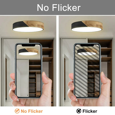 Round Wood Grain Black Flush Mount Ceiling Light 12 Inch 24W LED Fixture showing no flicker effect in a phone reflection