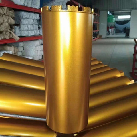 DaduoRi 8-inch diamond core drill bit standing upright; gold metal cylinder with toothed top for concrete cores.