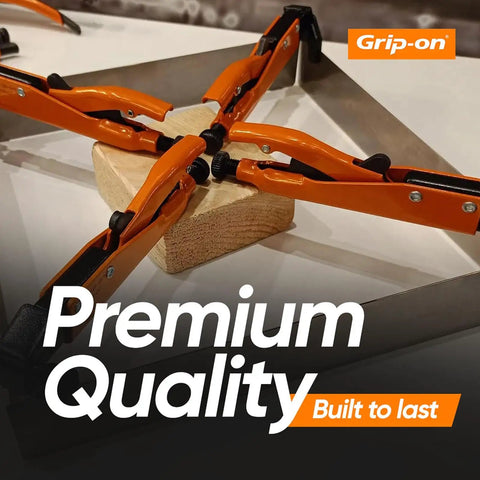 Orange 10 Piece Locking Pliers And Clamp Set with steel frame gripping a wooden block