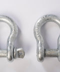Two galvanized 3/4 in bow shackles with 7/8 in screw pin, part of Four Pack Galvanized Bow Shackles Three Quarter Inch D Ring Shackle With Seven Eighths Inch Screw Pin Heavy Duty Recovery Gear For Four By Four Vehicles Built Tough With Rust Resistant Finish And High Load Capacity Off Road Ready