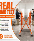 Heavy Duty Expandable Paint Drying Rack For Cabinet Doors With Smooth Casters And Hella Solid Steel Frame For Commercial Millwork And Serious Woodworking Projects Daily in use with carpenters testing stability.