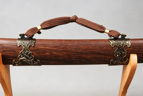 Close-up of natural grain rosewood scabbard of Folded Steel Dao Sword With Phoenix Motif, Handmade High Carbon Blade With 32,768 Layered Steel.