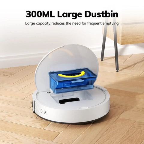 V2 Robot Vacuum Cleaner With Tangle Free Suction And Ultra Slim Two Point Nine Nine Inch Profile 120 Minute Runtime Self Charging Design Ideal For Pet Hair And Hard Floors on hardwood floor with open dustbin compartment showing blue 300ml dustbin