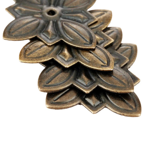 50 Pack Vintage Upholstery Nails Heavy Duty Iron Decorative Tacks For Furniture Makeover Rust Resistant Plated Surface detailed close-up of antique brass tacks.