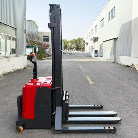 No Sweat Manual Hydraulic Pallet Stacker And Warehouse Lifter Cart with heavy duty swivel casters viewed from the side on a workshop floor.