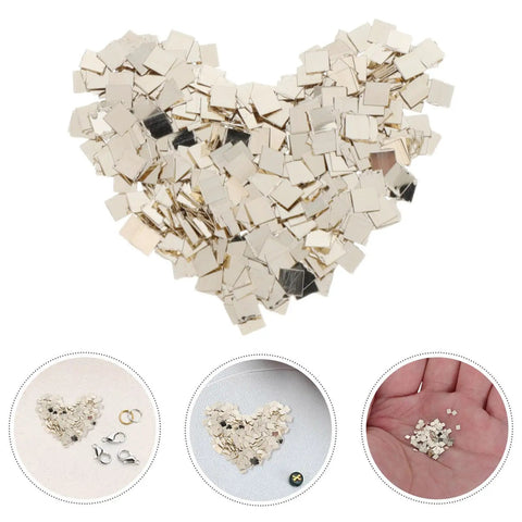 2 Packs Silver Soldering Sheets For Jewelry Make Secure Joints 0.08X0.08 Inch Precise Precut Soft Chips arranged in a heart shape.