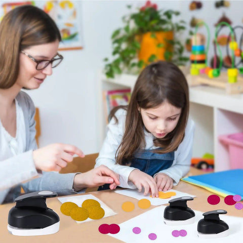 Child using Three Pack Circle Punches Set For Paper Crafts 1.5 Inch, 1 Inch, And 0.6 Inch Round Hole Punches in craft activity