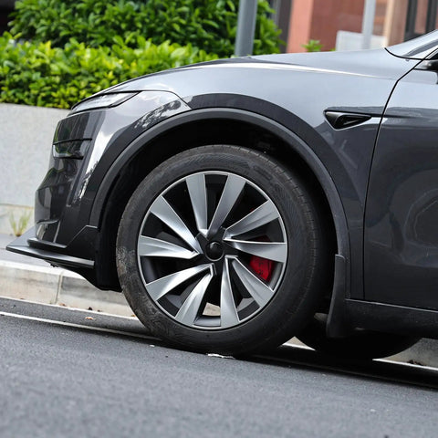 Ride Ready 4 Piece Wheel Covers For Tesla Model Y Juniper 19 Inch on sleek black and silver wheel, enhancing rim protection.