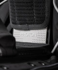 Photon Pro Women's Back-Inflation BCD With Modular Harness And Integrated Weight System, close-up of fabric and engraved tag