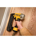 Using 18 Gauge Precision Point Brad Nailer with Compact Nose for Five Eighths Inch to Two and One Eighth Inch Nails in carpentry