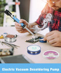 Person using Desoldering Iron Solder Sucker Pro Grade 2 In 1 Tool 110V Desoldering Pump With 1.0mm 1.2mm Nozzles