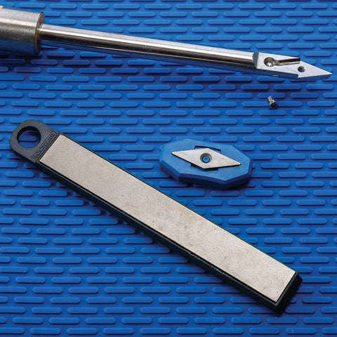 Carbide Cutter Honing System With Diamond Sharpening Tool And Magnetic Grip For Carbide Inserts displayed on blue surface