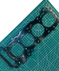 Top Shelf Performance Engine Gasket Seal Kit For Yamaha R6 And YZF R6 2006 Through 2024 cylinder head gasket on cutting mat.