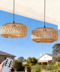 Laid Back Vibes 13 Inch Battery Powered Rattan Chandelier With Adjustable Brightness Dimmer And Timer For Gazebo Patio Or Pergola, featuring remote control and two hanging fixtures.
