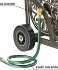 Mobile Hose Reel Cart With Wheels Holds Up To 200 Feet Of Five Eighth Inch Hose Heavy Duty Steel Frame With Storage Basket, detailing brass connector and leader hose.