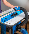 Fence Port Dust Brush For Router Table And Drill Press Cleanup With Flexible Two And Half Inch Hose And Ergonomic Nozzle in use