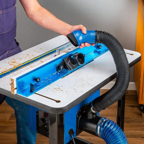Fence Port Dust Brush For Router Table And Drill Press Cleanup With Flexible Two And Half Inch Hose And Ergonomic Nozzle in use