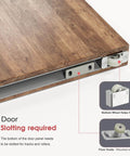 Close-up of the Ceakian 32 Inch Concealed Sliding Barn Door Hardware Kit with Soft Close showing bottom wheel and floor guide.