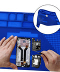 Insulated Magnetic Work Mat for Electronics Repair with high temperature silicone and antistatic surface in use for DIY projects.