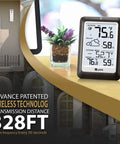 Dope Wireless Indoor Outdoor Thermometer Weather Station With Remote Sensor, backlit display shown on table with plant