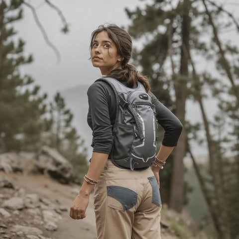 Woman hiking with Lightweight Hydration Backpack With 2L Bladder For Men And Women, Hands Free Water Pack
