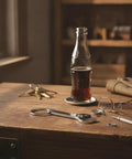 EDC Ready Zinc Alloy Multitool Keychain with bottle opener in polished silver on a wooden table