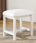 White Vanity Stool With Leather Cushioned Seat Small Vanity Chair For Makeup Desk in a modern room setting