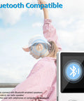 Bluetooth MP3 Player With Dope Built In Speaker And 64GB Card next to woman wearing earphones, displaying Bluetooth connection icon.