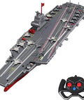 Amped Up Remote Control Warship Boat With 2 4G Link Twin Motor Power, gray battleship model, red accents, remote included.