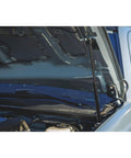 Toyota Tacoma Hood Lift Kit With Hydraulic Hood Assist Hands Free Lift No Prop Rod Easy Bolt On Hood Struts Pair For 2016 Through 2023 Models Gas Charged For Quick Engine Access And Safer Faster Hood Opens installed on open hood
