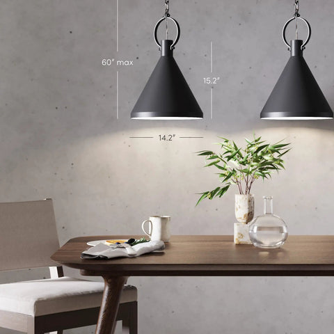 Industrial Pendant Light With Metal Shade And Adjustable Chain In Matte Black illuminating a dining table setup.