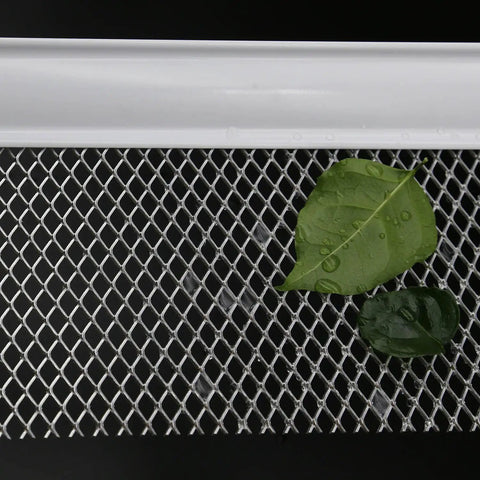 Thickened Aluminum Gutter Guard Roll, Heavy Duty Leaf Filter Shield for 5 Inch Gutters, 21 Feet, showing mesh with leaves