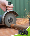 Beefy Angle Grinder Nut And Wrench Replacement Kit With Rigid Flange Spanner and secure locking hardware in use with sparks flying.