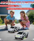 Kids playing with 1:24 Scale RC Truck With All Terrain Performance, High Speed 2WD Off Road Car With Lights And Load Space, 2.4GHz Remote