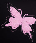 Close-up of pink lace butterfly design on car seat cover, part of Pink Lace Butterfly Car Seat Cover Set For Universal Fit, Easy Install.