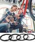 Woman and man adjusting a bike with Eight Piece Bike Headset Spacers Set For Road And Mountain Bikes Aluminum Alloy Washers