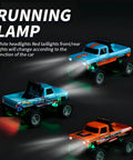 Mini 1 To 64 Scale Monster RC Truck With Lights 2 Point 4GHz Remote Adjustable Speed And Steering Portable Alloy Body Grey Ready To Roll showing headlights and taillights in dark setting