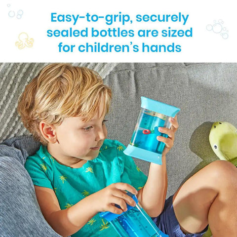 Child holding Ocean Sensory Bottles Fidget Toys For Kids 3 To 5 Kid Friendly Calming Quiet Focus Tools For Toddlers In Preschools Classroom Calm Down Corner Supplies Science Center Materials To Explore Buoyancy And Density In A Fun Way