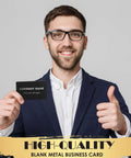 Man holding blank metal business card, smiling with thumbs up, wearing suit and glasses. 100 Piece Colorful Aluminum Engraving Blanks For Laser Etching 86 X 54 mm 0.21 mm Thick Multipurpose DIY Gift Cards And Business Cards Ten Color Options Including Gold Green Blue Purple Black Silver Matte Black Light Gold Rose Gold Red