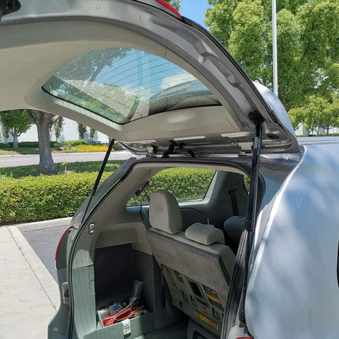 Open rear of car showing Rear Liftgate Lift Supports Set Of 2 For Ford Escape 2001-2012 And Mercury Mariner 2005-2012 Gas Shocks Struts 4370