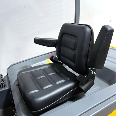 Heavy Duty Electric Pallet Stacker seat with cushioning, armrests, and control panel, designed for comfort and durability.