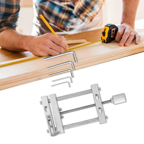 Compact Aluminum Alloy Bench Vise With Drill Press Mount For Woodworking And Engraving with hex keys and tape measure.