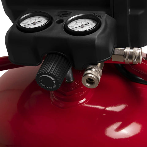 Close-up of the pressure gauge and control knob of the Smooth Operator 33 Gallon Air Compressor with an oil-free pump.